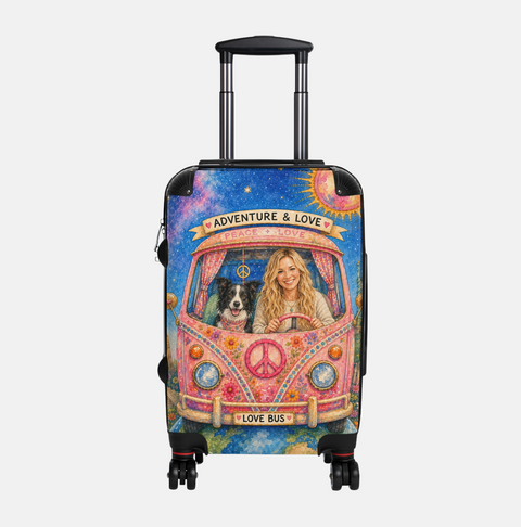 Colorful suitcase with a design of a woman, dog, and 'Love Bus' on a white background