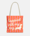 Tote bag with 'happiest with my dog' text and striped pattern on a white background